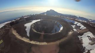 Flying over the summit of Mount Kilimanjaro [upl. by Ahtilat]