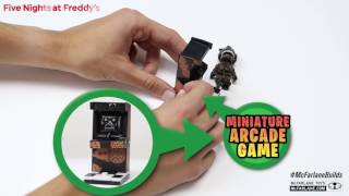 Five Nights at Freddys Phantom Freddy with Arcade Cabinet Construction Set  McFarlane Toys [upl. by Mastat]