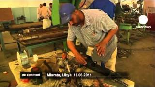 Libyan rebels build weapons in makeshift [upl. by Rana]