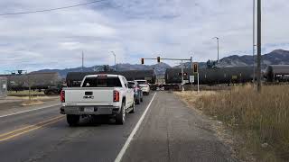 HornBlaring Train at the intersection Frontage Montana [upl. by Ojahtnamas]