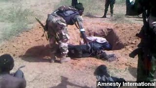 Gruesome Video Allegedly Shows Nigerian Military Abuses [upl. by Sawtelle433]