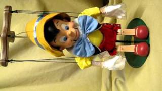 Disney Classic Holiday Singing Animated Pinocchio Puppet Marionette [upl. by Dugald718]