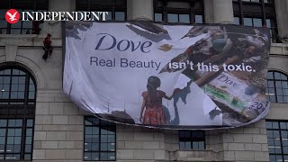 Climate activists scale Unilever headquarters in single use plastics protest [upl. by Piderit]