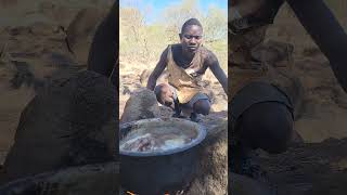 Hadzaabe cooking baboon meat in the wild [upl. by Assil]