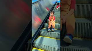 Fun on escalator😂cute babies sitting on escalator without fear😝🤪 shorts viralshorts short [upl. by Hussein]