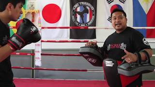 KRU Muay Thai Tip of the Week  Basic Thai Pad Holding Pt 1 [upl. by Okwu]