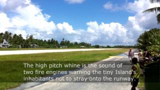 A plane landing at Tuvalus tiny airport in Funafuti in 2013 [upl. by Ardnalahs]