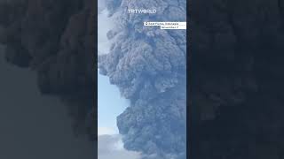 Massive volcanic eruption in Indonesia sends ash tower five miles high [upl. by Fugazy]