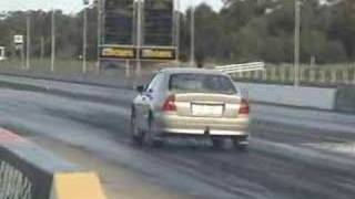 Mitsubishi Magna with no pipes Drag Racing  Heathcote Park Raceway [upl. by Gunter]