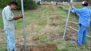 Setting Galvanized Fence Posts [upl. by Ellehsem498]