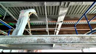 Amazing close up video of fire proofing fire cement onto steel deck [upl. by Adnov347]