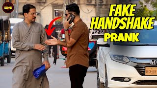 Fake Handshake Prank  Dumb TV [upl. by Soisanahta]