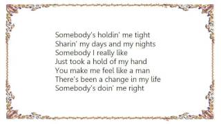 Keith Whitley  Somebodys Doin Me Right Lyrics [upl. by Aicnorev249]