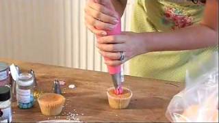 Xanthe Milton teaches you how to create a rose effect when icing cupcakes [upl. by Ellora]