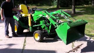 John Deere 1026R floppy bucket [upl. by Aitnohs397]