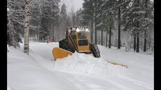 Volvo Tractor Snow Plowing village in Lappland [upl. by Heffron]