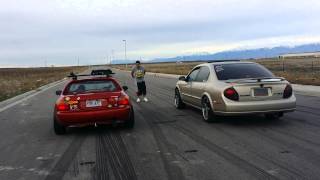 2000 Nissan Maxima vs Honda del sol turbo [upl. by Alyakem641]