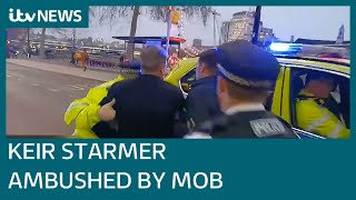 Boris Johnson under pressure as Keir Starmer is heckled by mob outside Parliament  ITV News [upl. by Brit]