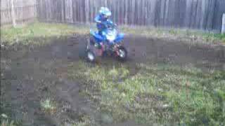 10 Year Old Boy Doing Donuts On 125cc Quad [upl. by Wagshul]