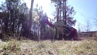 Takeuchi TL150 Skid Steer with a Fecon Mower [upl. by Coplin]