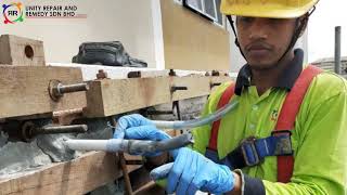 Concrete beam repair due to spalling with exposed repair using Sikagrout 215 at USM Penang [upl. by Alphonse]