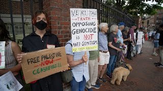 Some students walk out of Harvard commencement in protest [upl. by Ahron384]