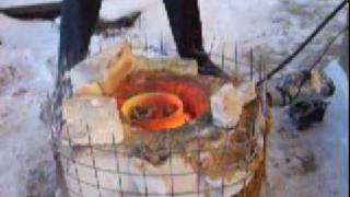 Melting aluminium at homemade easy foundry furnace and crucible [upl. by Oniluap]