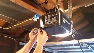 How to Program a Chamberlain Garage Door Remote Control Opener [upl. by Milde836]