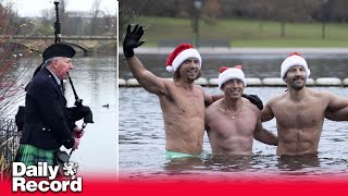 Hundreds dive in for Christmas Day swim at the Serpentine [upl. by Teraj251]