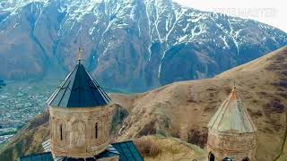 Amazing Gergeti church in Kazbegi drone footage and areal views [upl. by Bethesde]