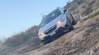 2023 Subaru Crosstrek offroad climbing and descending a very slippery and bumpy dirt hill [upl. by Epperson]