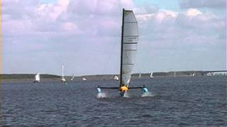 Windrider Rave Hydrofoil trailerable trimaran  boat vs Corsair F24 trimaran [upl. by Enelak]