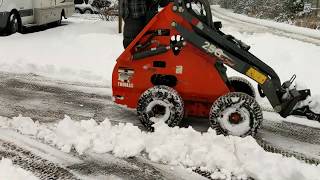 Miniskid Loader snowplow part 2 Wet snow [upl. by Ahsial]