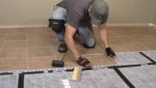 Heated Floor Tile Installation [upl. by Epolulot]