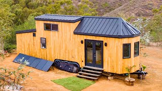 Custom Welded Flatbed Trailer By Tiny House Basics  Living Design Tiny House [upl. by Solahcin]