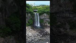 Jeongbang Waterfall in Jeju jeju waterfall korean koreatravel dji djimini3 drone dronevideo [upl. by Akiemat]