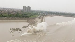 Worlds Largest Tidal Bore Forms in Chinas Qiantang River [upl. by Sadnac132]