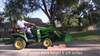 John Deere 1026R Front Axle Suspension [upl. by Enirehtac]