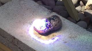 Solar heat ray lens from TV melts rock into lava then glass [upl. by Sasha]