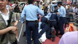 Captions French protester arrested in Japan quotShoot amp kill themquot  extremist group to police [upl. by Esej]