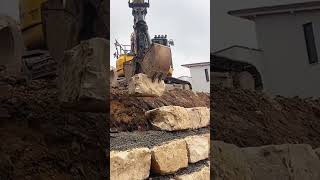 Limestone retaining wall construction process [upl. by Klug]