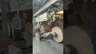 PE kraft coating machine working in paper cup factory [upl. by Arted]