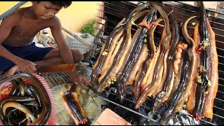 Amazing Two Children Cook Eel For Lunch  How To Cook Eel In Cambodia [upl. by Nomit]