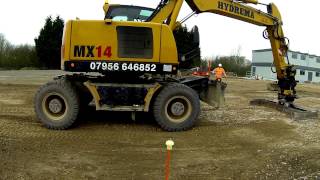 Engcon Grading Beam Hydrema MX14 Wheeled Excavator [upl. by Delp]