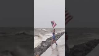 People wave American flag in Hurricane Helenes high winds Shorts [upl. by Joab]