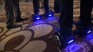 CES 2015 IO Hawk the Segways New MiniRival  Consumer Reports [upl. by Limhaj461]