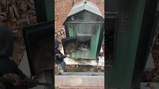 Cleaning out the wood boiler woodboiler woodstove homeheating [upl. by Noffets]