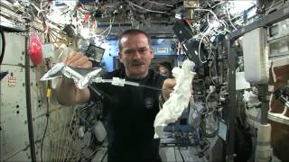 Wet Washcloth In Space  What Happens When You Wring It  Video [upl. by Novyar906]