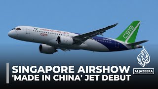 China’s C919 jetliner showcased at Singapore Airshow [upl. by Navetse]