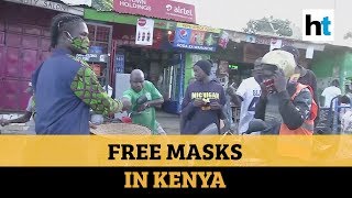 COVID19 Kenyan fashion designer makes distributes free masks in Kibera slum [upl. by Clower]